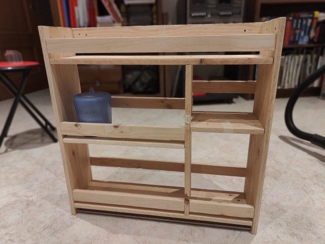 Photo of a cat named Shakespeare sitting on a window sill