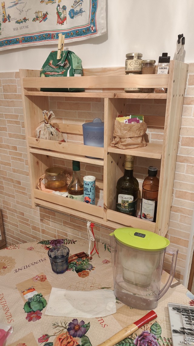 Photo of a cat named Shakespeare sitting on a window sill